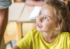 We want more! student in classroom
