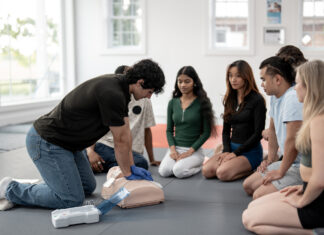 The day TBLT died Instructor Demonstrating CPR Techniques to a Diverse Group of Pupils in Training