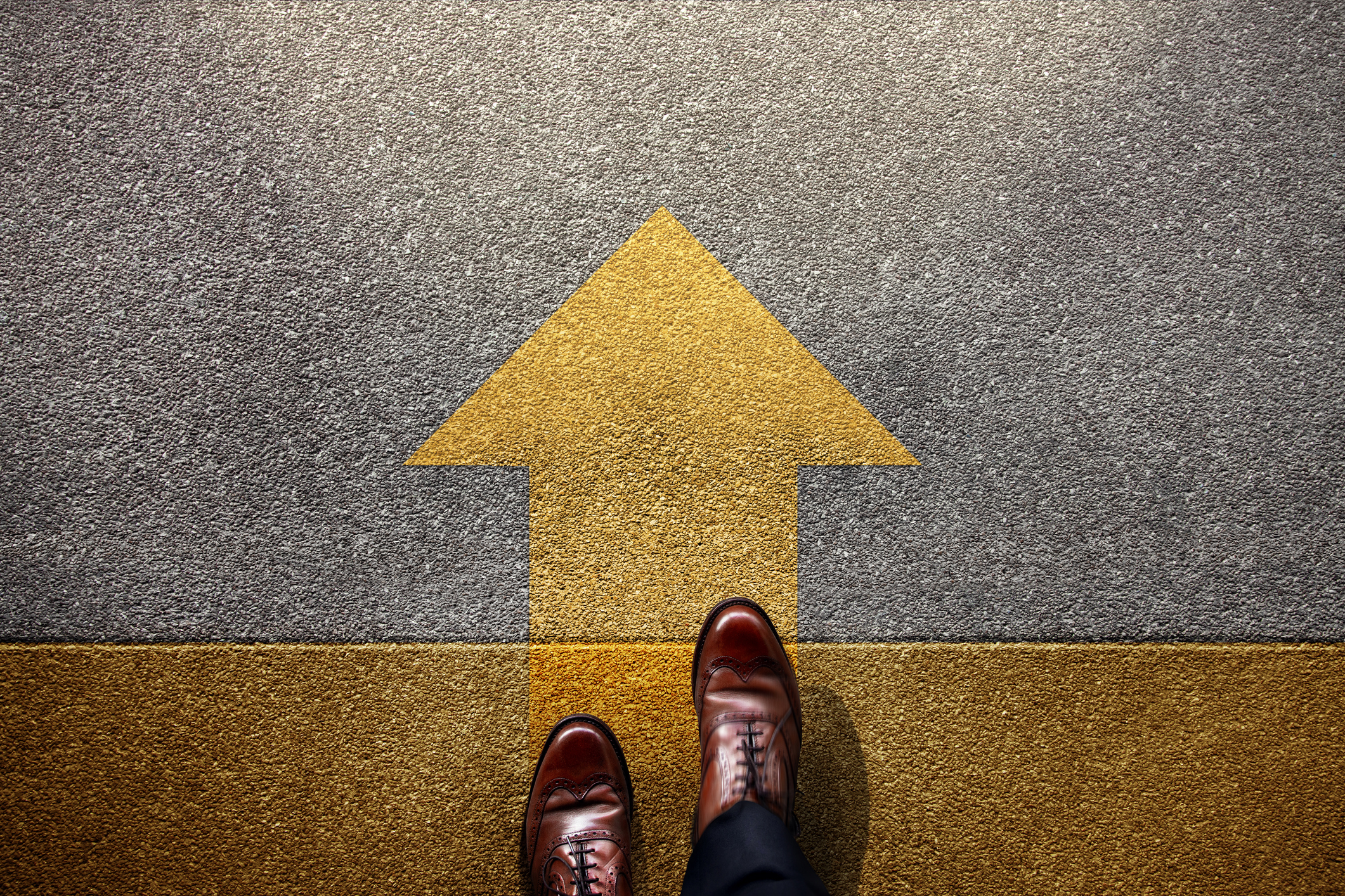 arrow in ground showing direction of travel