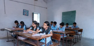 Gurus in the rough: no need to dig deep in Dharavi children at desk in classroom