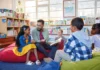 Once upon a time there was… children sitting on beanbags with teacher reading