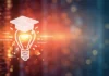 Performance management in the age of AI graphic of lighbulb with graduation hat