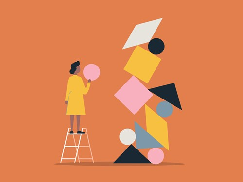 Illustration of a person in a yellow coat standing on a ladder, arranging a tall stack of colourful geometric shapes against an orange background.