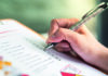 ‘Quality is everyone’s responsibility’ A hand holding a pen, checking boxes on a checklist clipboard with partially visible text items.