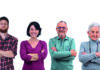 Recruitment and motivation of teachers from different generations A diverse group of seven adults standing in a row with arms crossed, each displaying a neutral or slight smile. They are dressed in casual clothing of various styles and colours, against a plain white background.