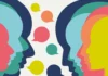 Decolonising EFL: why we (still) need it Illustration of colourful silhouettes of faces in profile facing each other with multicoloured speech bubbles between them on a white background.