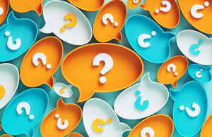 A collection of colourful 3D speech bubbles in orange, blue, and white, each containing a question mark, set against a muted green background.