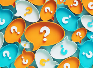 Meaning, form and pronunciation of complex sentences? A collection of colourful 3D speech bubbles in orange, blue, and white, each containing a question mark, set against a muted green background.