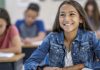 Multilingual learners who are gifted Young student smiling in classroom