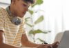 Seven steps to writing a coherent essay Young student on laptop