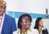 Why should school leaders develop emotional intelligence? Teachers chatting in corridor