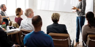 From ‘Good job!’ to growth seated adults listening to lecturer
